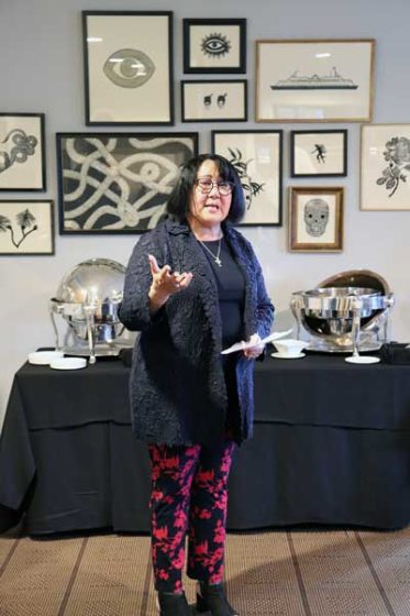 Our CEO Patricia giving a speech at our Spring Raising Power event