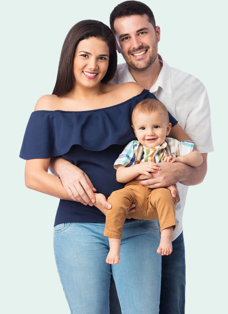thswa-hero-photo A man and woman holding their baby and smiling.