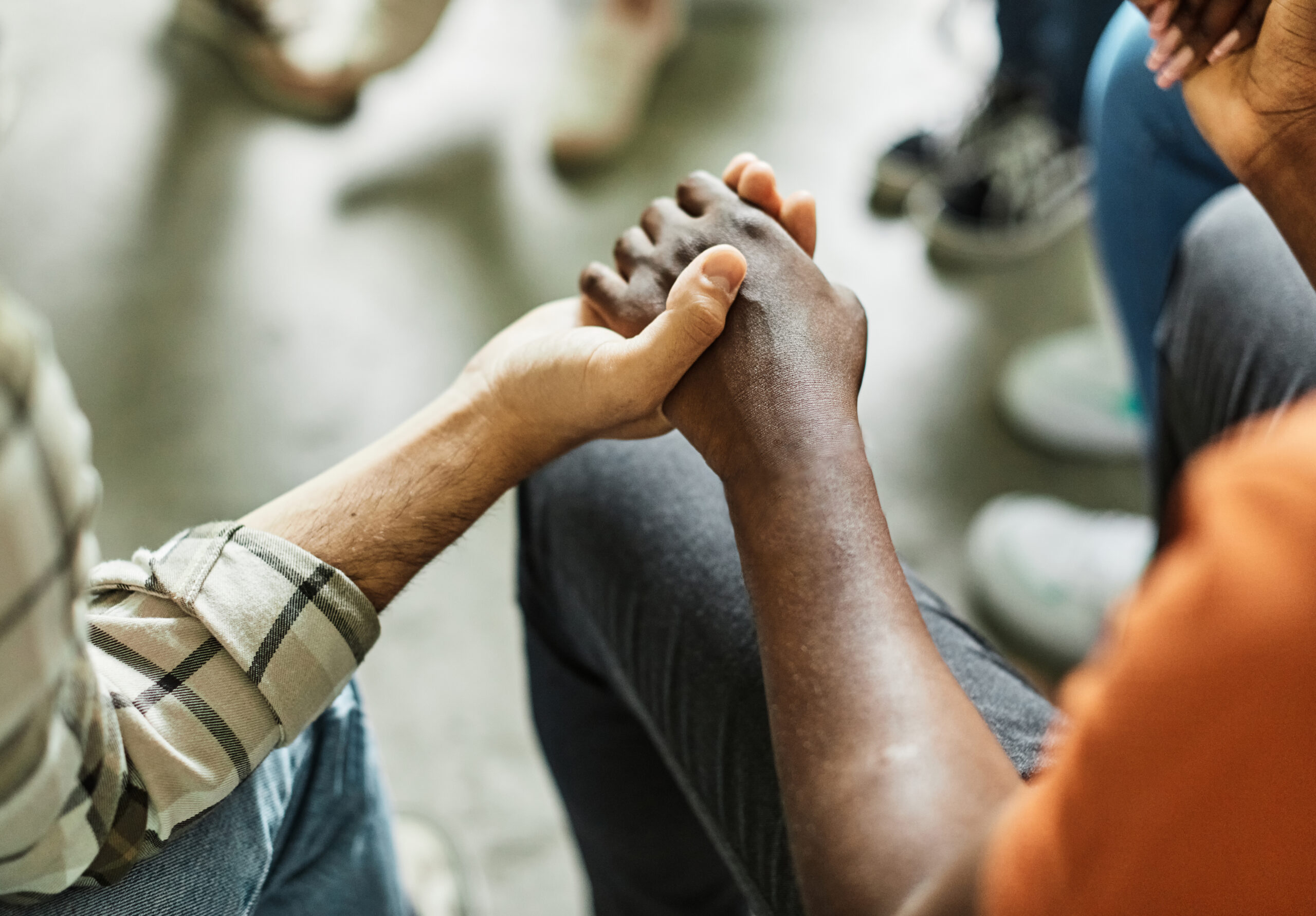 psychotherapy meeting woman support group man therapy psychology hand care closeup holding concept togetherness love hold