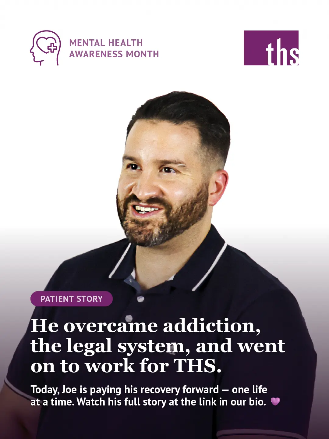 A patient story graphic for Therapeutic Health Services. In the top left, a purple "Patient Story" badge. The THS logo appears in the top right. A man with dark hair and a beard, wearing a dark polo shirt, smiles at the camera against a white background. A purple gradient fades up from the bottom of the image. Bold white text reads: "He overcame addiction, the legal system, and went on to work for THS." Below in smaller white text: "Today, Joe is paying his recovery forward — one life at a time. 💜 Watch his full story at the link in our bio."