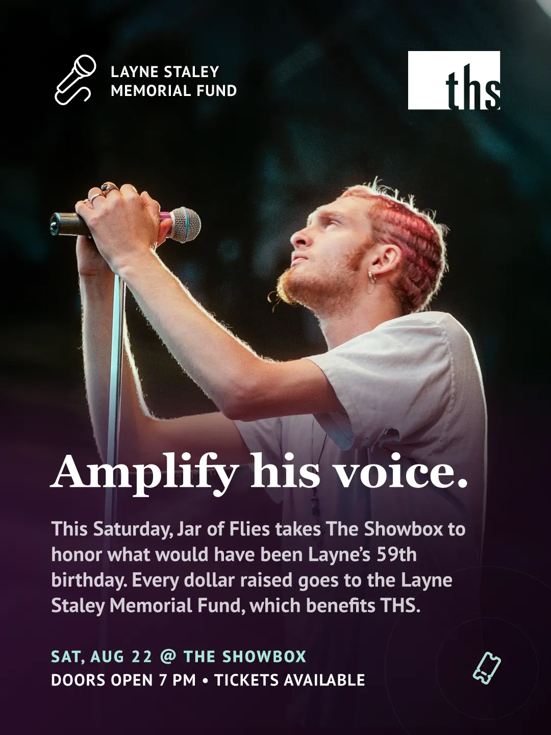 Photo of Layne Staley singing into a microphone, head tilted back, wearing a light-colored t-shirt against a dark background transitioning to deep purple. "Layne Staley Memorial Fund" label with microphone icon, top left. THS logo top right. Bold white serif headline: "Amplify his voice." Subtext: this Saturday, Jar of Flies takes The Showbox to honor what would have been Layne's 59th birthday, with proceeds going to the Layne Staley Memorial Fund, which benefits THS. Event details in teal and white: Saturday, August 22, at The Showbox, doors open 7 PM, tickets available. Ticket icon bottom right.